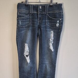 Low-Rise Distressed Skinny Jeans in Dark Blue